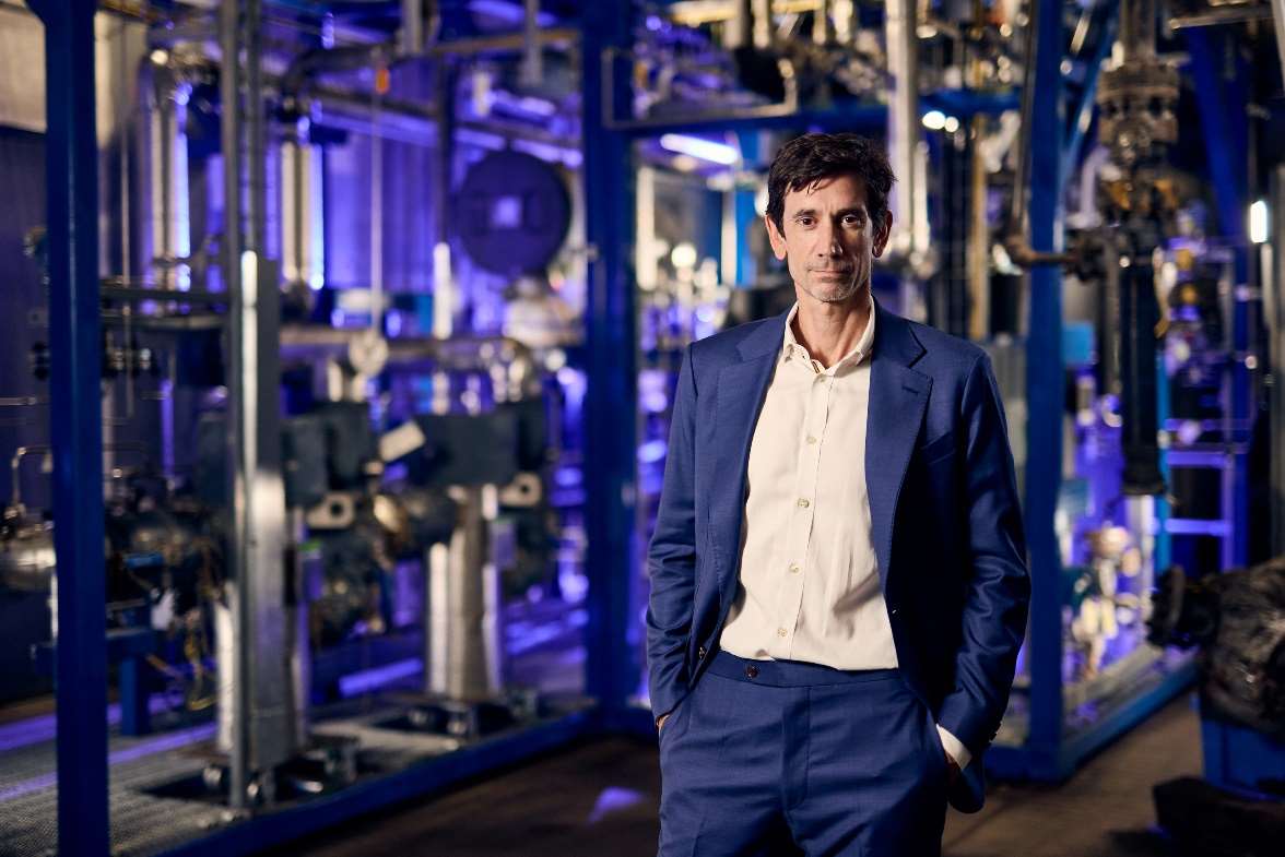 Aether’s CEO Conor Madigan in front of a section of a 100 gallon-per-day (gpd) scale test production facility built by strategic partner GTI Energy at their Chicago-area campus. Aether will apply a portion of the new funds to expand this test production facility to carry out a fully integrated 100 gpd scale demonstration of its proprietary Aether Aurora™ solution.